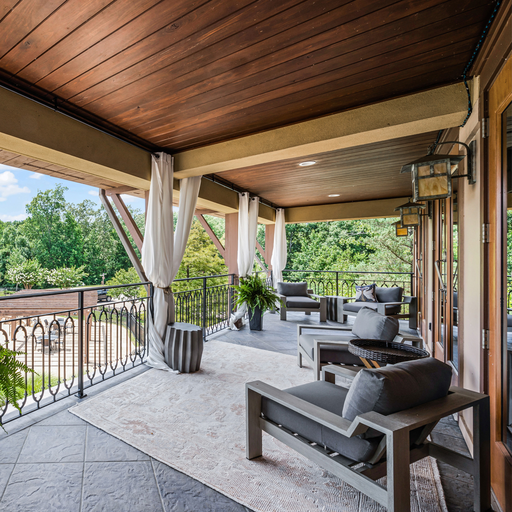 Gorgeous Views of the Clubhouse Outdoor Amenities from the Second Level Stone Deck